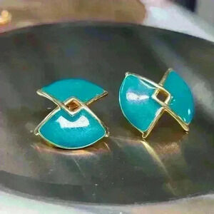 Monet gold tone green enamel bow shaped earrings
